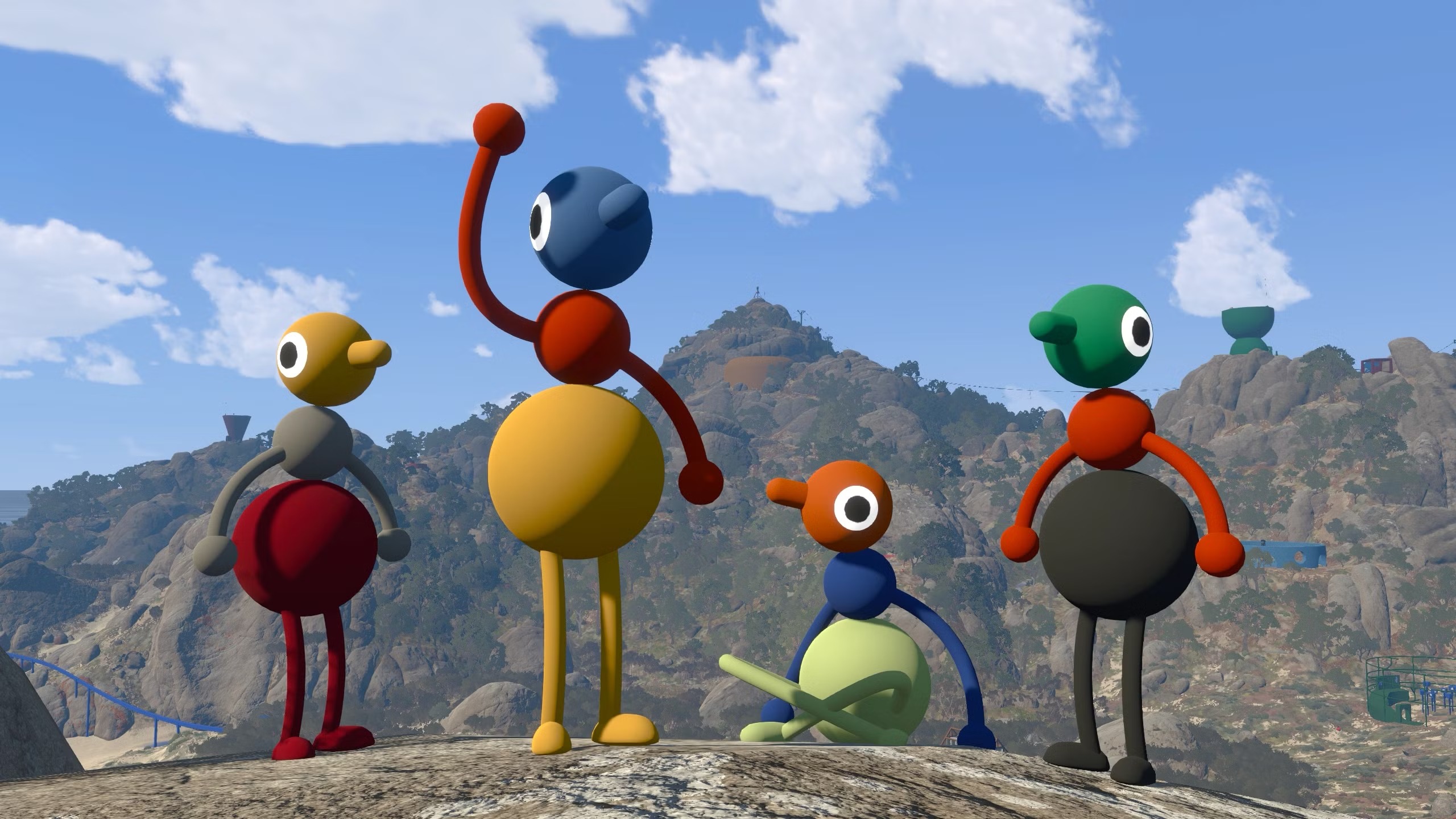 A group of colorful Big Walk characters overlooking the island